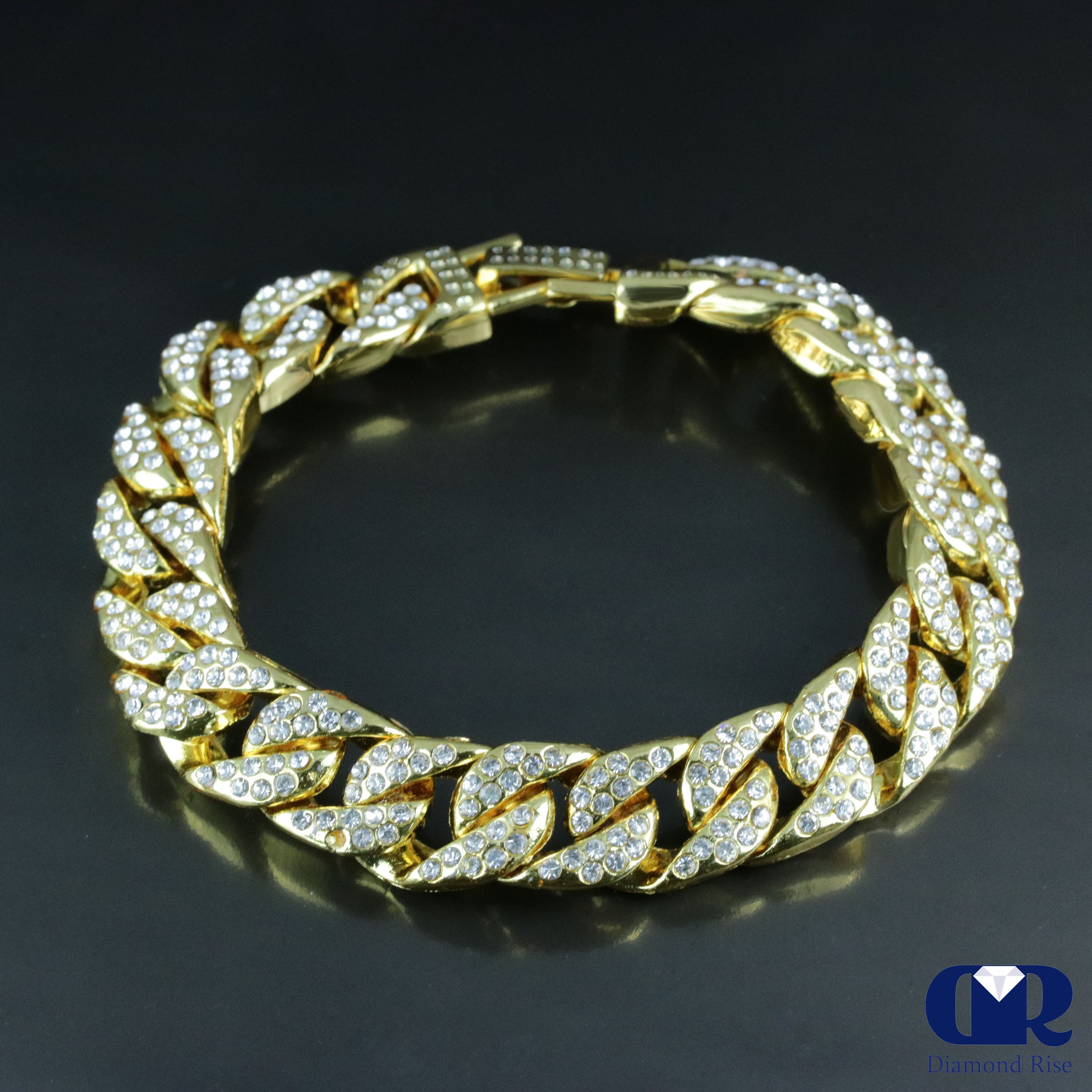 Fancy Cuban Men's Bracelet Solid gold with diamond lock.
