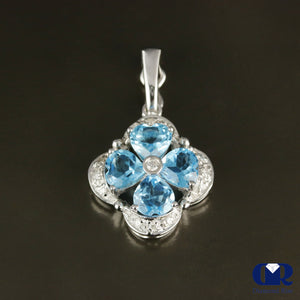 Blue Topaz & Diamond Pendant In 18K Gold - Diamond Rise Jewelry