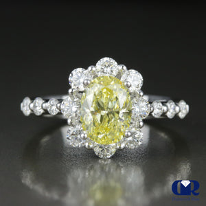 2.30 Carat Fancy Yellow Oval Diamond Halo Engagement Ring In 18K White Gold - Diamond Rise Jewelry